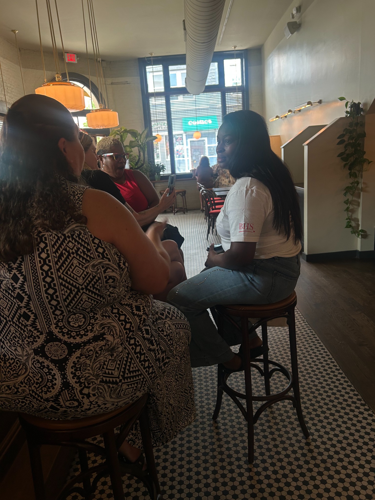 Women connecting at Coffee and Conversations